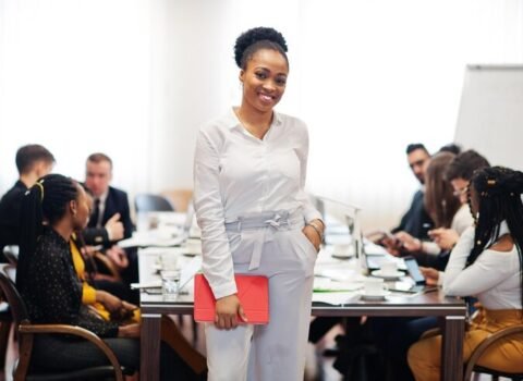 face-handsome-african-american-business-woman-holding-tablet-background-business-peoples-multiracial-team-meeting-sitting-office-table_627829-13639